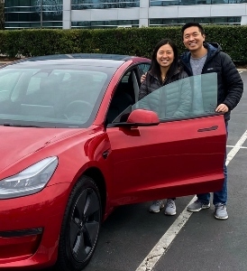 Tesla with customers smiling after repair at Alioto’s Auto Body San Francisco Tesla-with-customers-smiling-after-repair-at-Aliotos-Auto-Body-San-Francisco