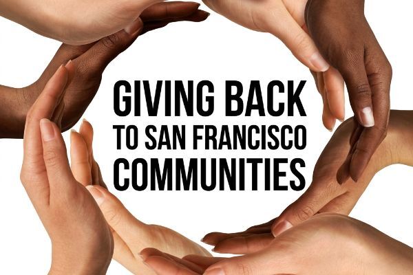 a-circle-of-hands-with-Giving-Back-to-San-Francisco-Communities-Aliotos-Auto-Body.