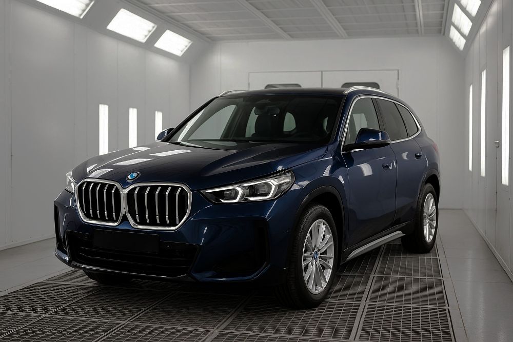 Blue-BMW-X1-in-paint-booth-at-Blue-BMW-in-Paint-Booth-at-Aliotos-BMW-Certified-Collision-Center