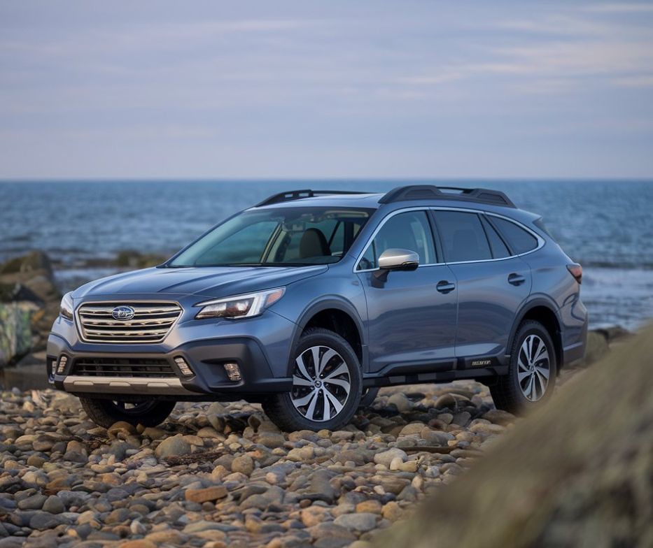 Blue-Subaru-sitting-near-water-in-rocks-Aliotos-Certified-Collision-Repair