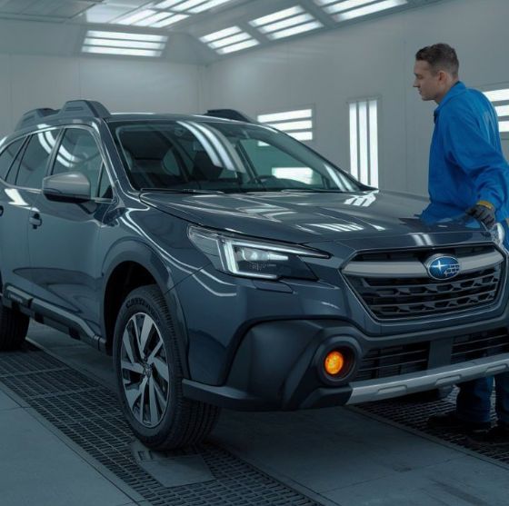Subaru-in-body-shop-with-technician-Aliotos-Auto-Body