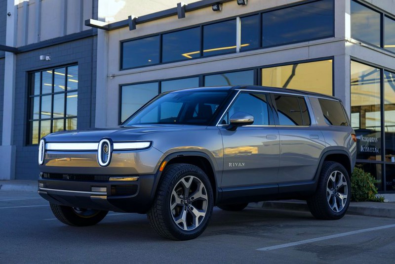 Rivian-truck-sitting-next-to-a-building-ater-collision-repair-at-Aliotos-Atuo-Body-San-Francisco