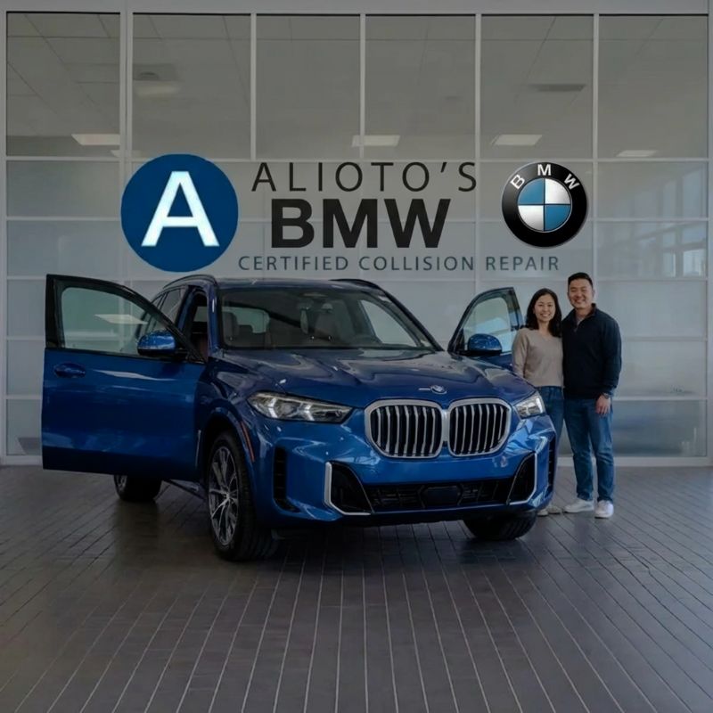 customers-next-to-blue-bmw-after-bmw-certified-collision-repair-at-Aliotos-Auto-Body-San-Francisco