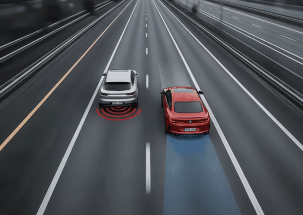 Red-and-silver-BMW-cars-on-highway-showing-how-ADAS-works-for-Aliotos-Auto-Body-San-Francisco